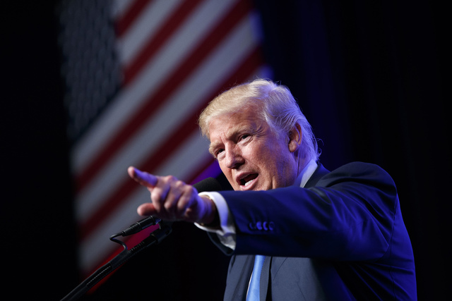 Republican presidential candidate Donald Trump speaks during a campaign rally at the James L. Knight Center, Friday, Sept. 16, 2016, in Miami. (AP Photo/ Evan Vucci)