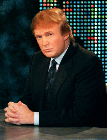 n this Oct. 7, 1999 file photo, Donald Trump waits to be interviewed by talk show host Larry King during a taping of "Larry King Live," in New York. Trump said he has formed an exploratory committ ...