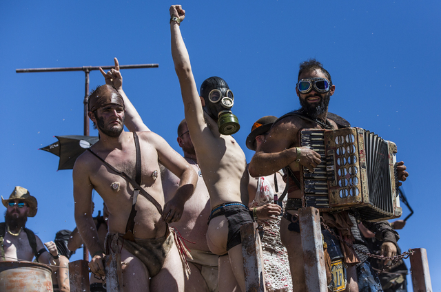 Contestants give one final group dance during the post-apocalyptic swimsuit contest during the seventh annual Wasteland Weekend on Saturday, Sept. 24, 2016, in California City, Calif. The four day ...