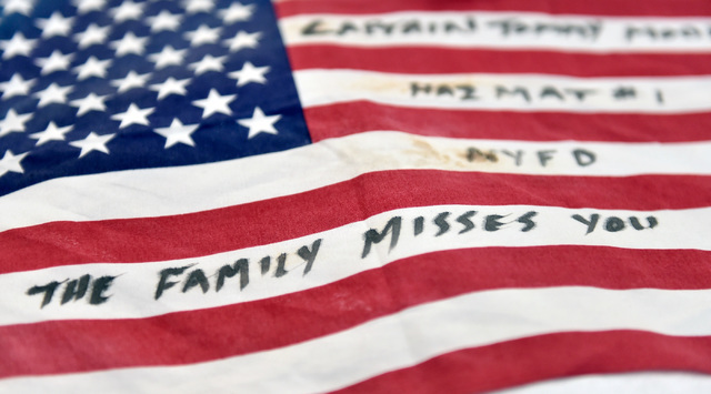A personalized American flag gathered from the New York-New York Hotel and Casino's 9-11 heroes tribute memorial Wednesday, Sept. 7, 2016, in Las Vegas. The library, with financial assistance from ...