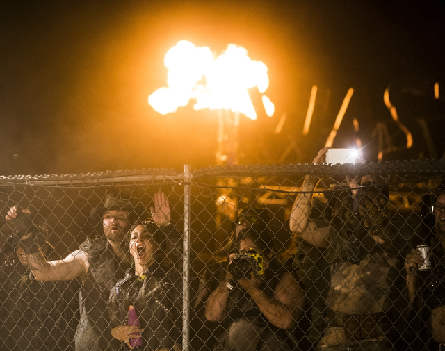 The crowd cheers as gladiators battle during the seventh annual Wasteland Weekend on Friday, Sept. 23, 2016, in California City, Calif. The four day, post-apocalyptic festival takes place in the M ...