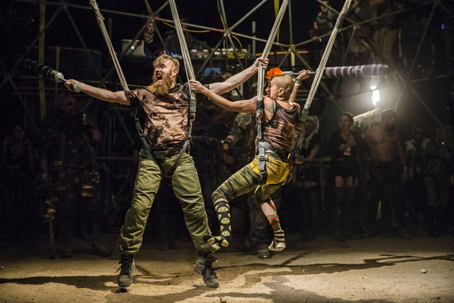 Festival goers battle in a replica of the thunderdome during the seventh annual Wasteland Weekend on Friday, Sept. 23, 2016, in California City, Calif. The four day, post-apocalyptic festival take ...