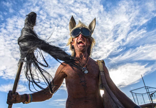 Keru McKenzie poses for a photo during the seventh annual Wasteland Weekend on Saturday, Sept. 24, 2016, in California City, Calif. The four day, post-apocalyptic festival takes place in the Mojav ...
