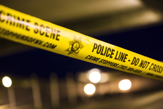 Las Vegas Metro taped off most of the top floor of the parking garage at McCarran International Airport after two people were shot in a domestic incident on Monday, Sept. 19, 2016, in Las Vegas. B ...