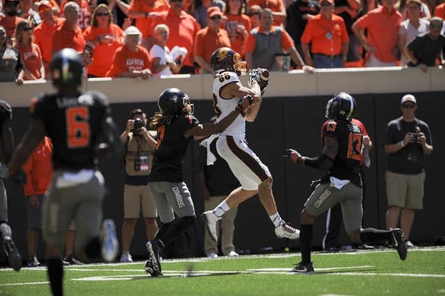 Central Michigan wide receiver Jesse Kroll (80) catches a pass at the end of a NCAA college football game between Central Michigan and Oklahoma St in Stillwater, Okla., Saturday, Sept. 10, 2016. ( ...