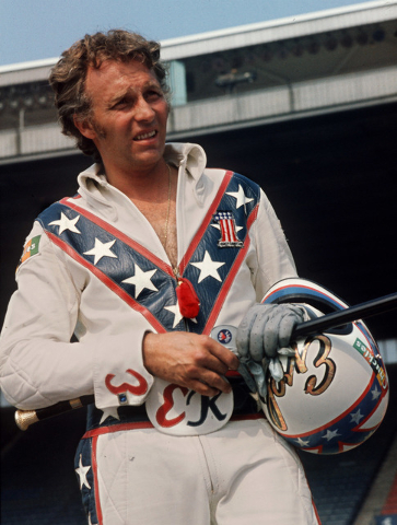 FILE - In this Aug. 20, 1974, file photo, daredevil motorcyclist Evel Knievel poses at the open-air Canadian national exhibition stadium in Toronto. Fueled by the memory of the late daredevil Knie ...