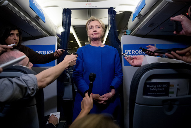 Democratic presidential candidate Hillary Clinton pauses while she remarks on the explosion in Manhattan's Chelsea neighborhood onboard her campaign plane at Westchester County Airport, in White P ...