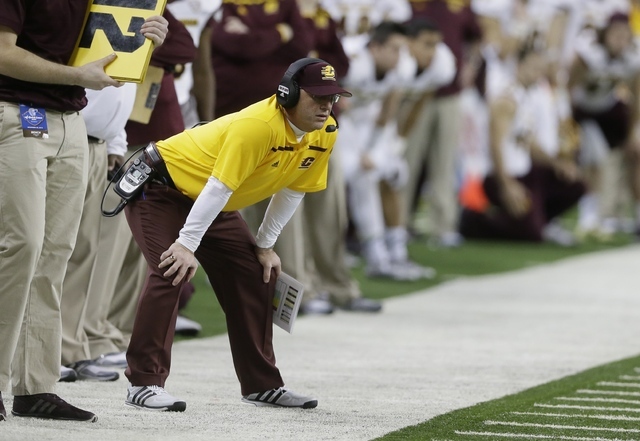 Central Michigan head coach John Bonamego watches from the sidelines during the second half of the Quick Lane Bowl NCAA college football game against Minnesota, Monday, Dec. 28, 2015, in Detroit.  ...