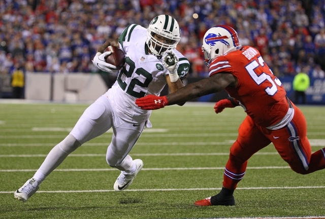 New York Jets running back Matt Forte (22) runs against Buffalo Bills linebacker Zach Brown (53) during the second half an NFL football game on Thursday, Sept. 15, 2016, in Orchard Park, N.Y. (AP ...