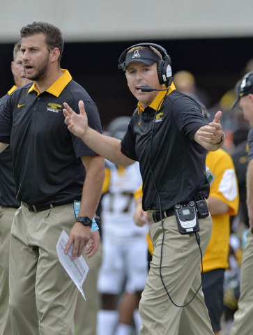 Appalachian State's head coach Scott Satterfiled reacts during the second half of an NCAA college football game against Clemson Saturday, Sept. 12, 2015, in Clemson, S.C. Clemson won 41-10. (AP ...