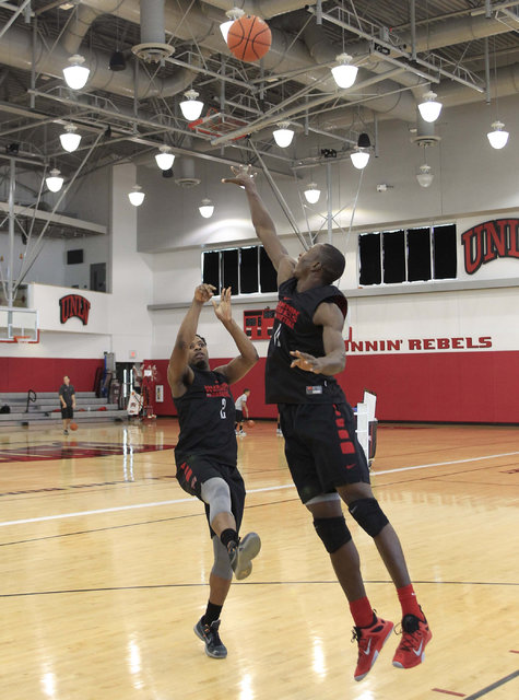UNLV's Uche Ofoegbu (2) shoots over Cheickna Dembele during team practice at the Mendenhall Center at UNLV in Las Vegas on Monday, Aug. 8, 2016. (Richard Brian/Las Vegas Review-Journal) Follow @ve ...