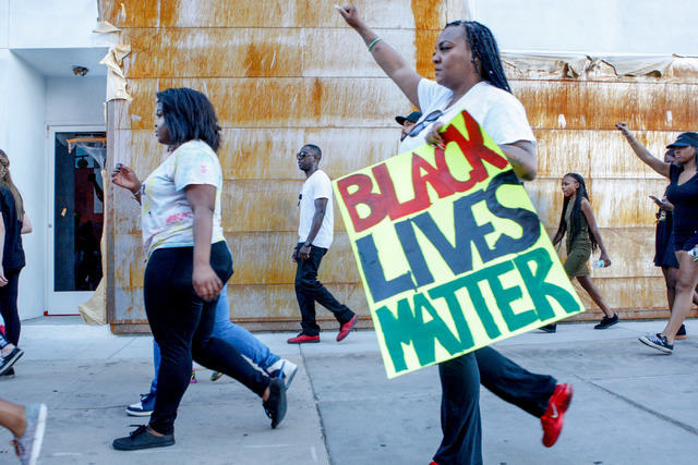 Protesters march in downtown Las Vegas during a Black Lives Matter demonstration on Saturday evening, July 16, 2016. (Elizabeth Brumley/Las Vegas Review-Journal) Follow @Elipagephoto