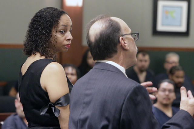 Clark County Public Defender Phil Kohn, right, presents his argument as Erika Ballou, a deputy public defender, looks on Thursday, Sept. 22, 2016, at the Regional Justice Center in Las Vegas. Bizu ...