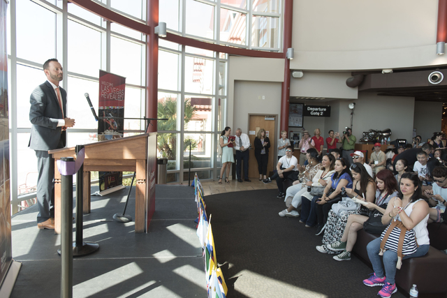 At Boulder City Municipal Airport, Geoff Edlund, president of Papillon Grand Canyon Helicopters, speaks during a ribbon cutting ceremony for the company's new Hoover Dam heliport in Boulder City,  ...