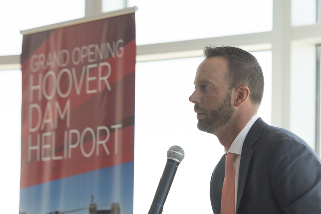 At Boulder City Municipal Airport, Geoff Edlund, president of Papillon Grand Canyon Helicopters, speaks during a ribbon cutting ceremony for the company's new Hoover Dam heliport in Boulder City,  ...