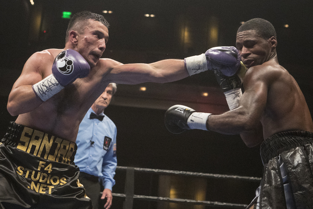 Sanjarbek Rakhmanov connects with Marquis Hawthorne during their welterweights boxing match at the Cosmopolitan hotel-casino in Las Vegas on Friday, Sept. 16, 2016. (Loren Townsley/Las Vegas Revie ...
