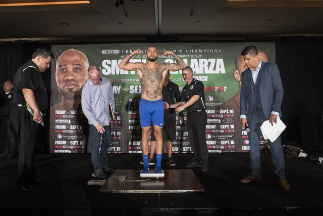 Frank Galarza steps on the scale during weigh-ins at the Cosmopolitan hotel-casino on Thursday, Sept. 15, 2016 in Las Vegas. Loren Townsley/Las Vegas Review-Journal Follow @lorentownsley