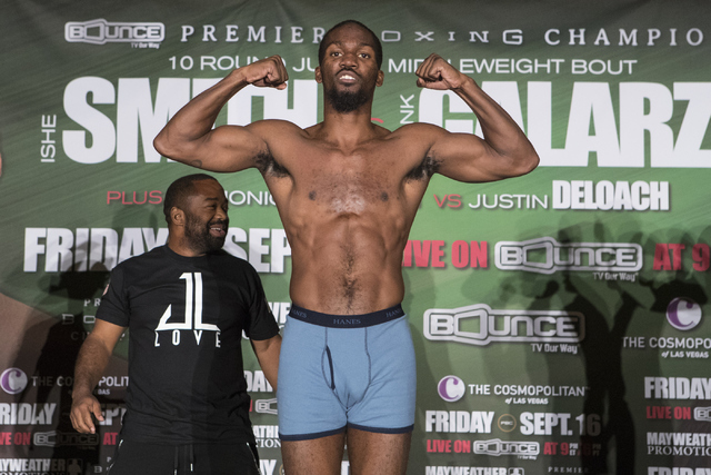 Dominique Dolton steps on the scale during weigh-ins at the Cosmopolitan hotel-casino on Thursday, Sept. 15, 2016 in Las Vegas. Loren Townsley/Las Vegas Review-Journal Follow @lorentownsley