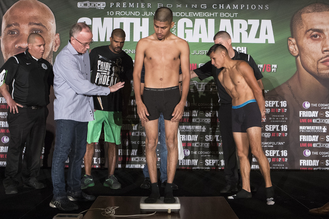 Alexis Santiago steps on the scale during weigh-ins at the Cosmopolitan hotel-casino on Thursday, Sept. 15, 2016 in Las Vegas. Loren Townsley/Las Vegas Review-Journal Follow @lorentownsley