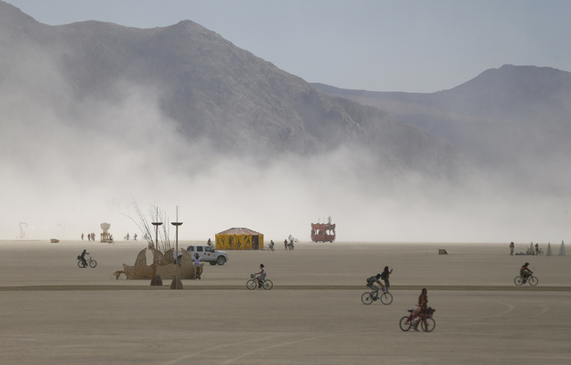 Attendees roam the deep playa during Burning Man at the Black Rock Desert north of Reno on Wednesday, Aug. 31, 2016. Chase Stevens/Las Vegas Review-Journal Follow @csstevensphoto