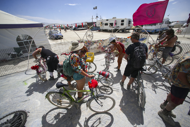 Attendees modify and decorate their bikes at the bicycle mutation station during Burning Man at the Black Rock Desert north of Reno on Wednesday, Aug. 31, 2016. Chase Stevens/Las Vegas Review-Jour ...