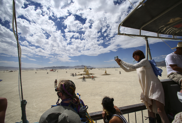 Attendees aboard the USS Nevada art car taken the sights during Burning Man at the Black Rock Desert north of Reno on Wednesday, Aug. 31, 2016. Chase Stevens/Las Vegas Review-Journal Follow @csste ...