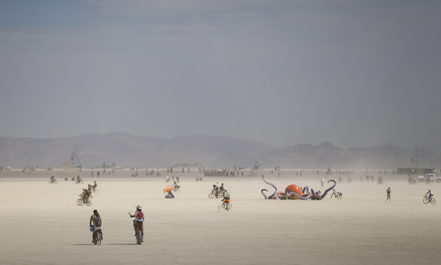 Attendees roam the playa during Burning Man at the Black Rock Desert north of Reno on Wednesday, Aug. 31, 2016. Chase Stevens/Las Vegas Review-Journal Follow @csstevensphoto