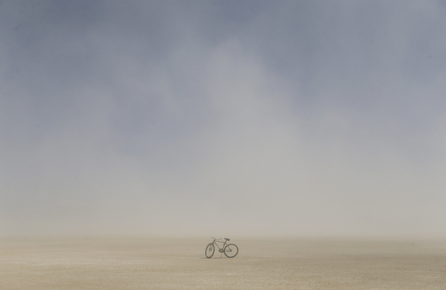 A lone bike sits on the playa during Burning Man at the Black Rock Desert north of Reno on Thursday, Sept. 1, 2016. Chase Stevens/Las Vegas Review-Journal Follow @csstevensphoto