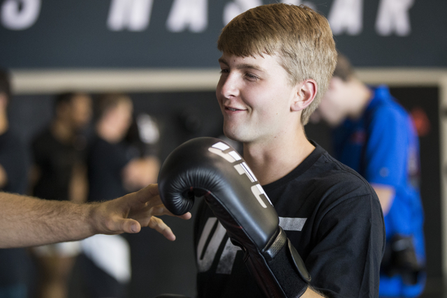 NASCAR Camping World Truck Series Chase driver William Byron, 18, participates during an open workout with mixed martial art fighters at the Ultimate Fighter Gym on Friday, Sept. 30, 2016, in Las ...