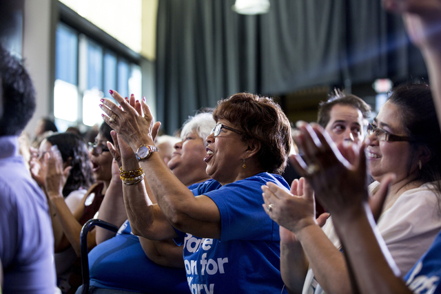 Hillary Clinton supporters applaud former President Bill Clinton as he campaigns on behalf of Democratic presidential nominee Hillary Clinton at the College of Southern Nevada in North Las Vegas,  ...