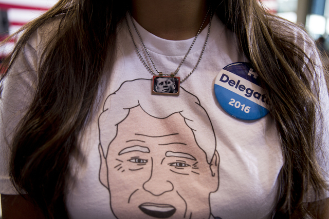 A Hillary Clinton supporter wears a t-shirt depicting former President Bill Clinton at a campaign stop on behalf of Democratic presidential nominee Hillary Clinton at the College of Southern Nevad ...