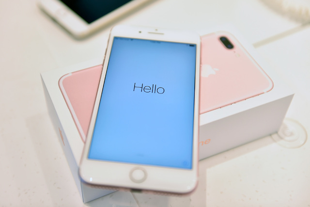 A new iPhone 7 Plus is displayed as it is powered up at an AT&T store Friday, Sept. 16, 2016, in Las Vegas. Apple's newest iPhone went on sale on Friday featuring an all-new advanced camera s ...