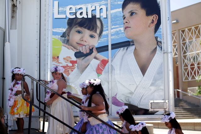 Members of the group Hula Girl Rocks wait to perform at the Ho'olaule'a Pacific Islands Festival on Sunday, Sept. 11, 2016, at the Henderson Events Plaza in Henderson. Rachel Aston/Las Vegas Revie ...