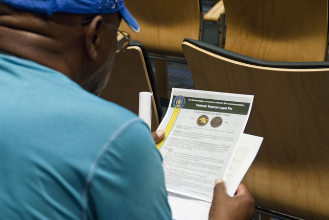 Harold Ashley reviews information about a pin he received in honor of his service during the Vietnam War era at the VA Medical Center in North Las Vegas on Thursday, Sept. 15, 2016. (Daniel Clark/ ...