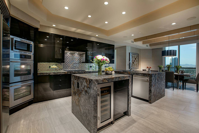 The kitchen is equipped with an oversized Subzero refrigerator