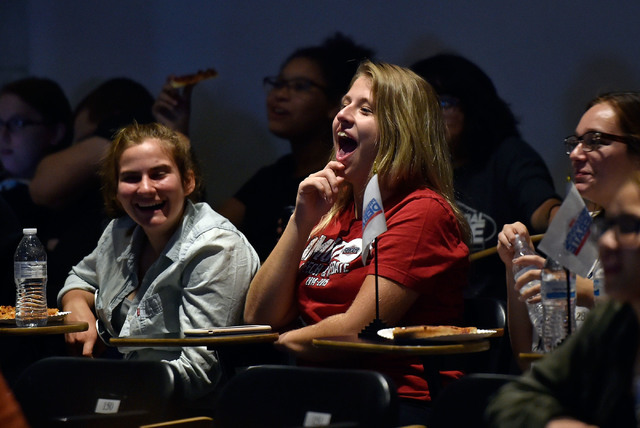Desert Oasis High School student Kaitlyn Willoughby chuckles as she watches the presidential debate during an event at UNLV Monday, Sept. 26, 2016, in Las Vegas. Several hundred college, middle an ...