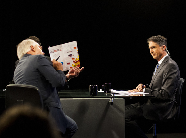 Pat Hickey, with Nevadans for Responsible Drug Policy, points to an information pamphlet during a Vegas Public Broadcasting Service roundtable discussion regarding the Nevada Marijuana Legalizatio ...
