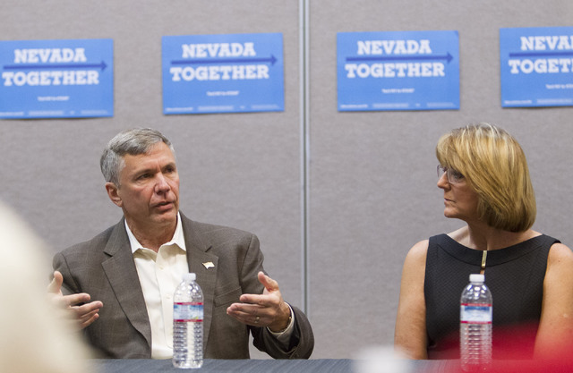 Brig. Gen. Daniel Woodward and retired  Air Force Maj. Gen. Margaret Woodward speak to veterans and other officials during a roundtable discussion of national security at the Silver Mesa Recreatio ...