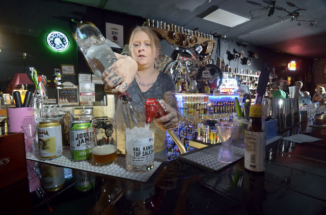 Bartender and general manager Shani Garrett mixes a drink at Rebar at 1225 S. Main St. in Las Vegas Aug. 27. Bill Hughes/View