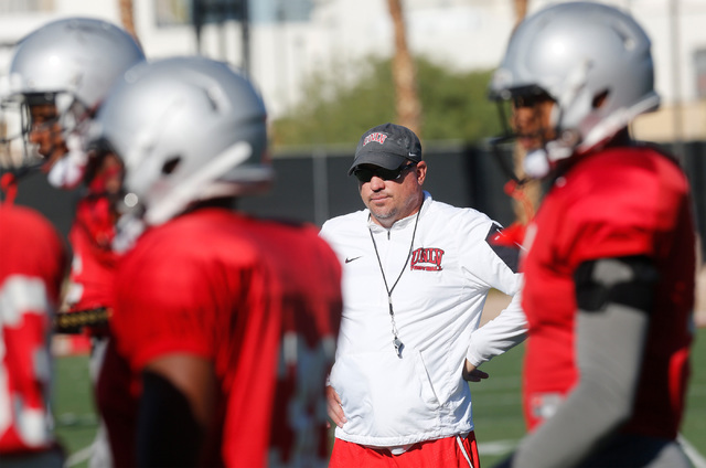 UNLV football coach Tony Sanchez, center, watches a team drill during practice at Rebel Park in Las Vegas, Tuesday, Sept. 13, 2016. (Chitose Suzuki/Las Vegas Review-Journal)