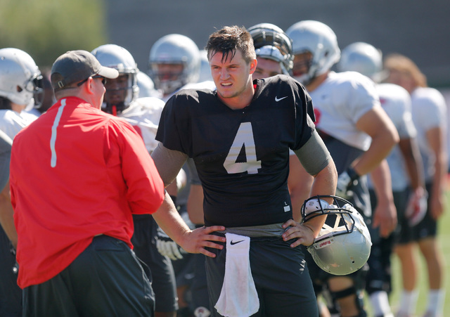 UNLV quarterback Johnny Stanton (4) listens to a coach during practice at Rebel Park in Las Vegas, Tuesday, Sept. 13, 2016. (Chitose Suzuki/Las Vegas Review-Journal)