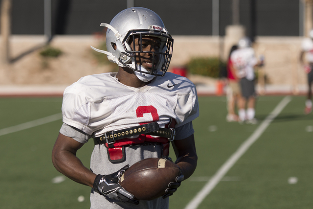 Lexington Thomas (3) takes a rest during football practice at UNLV's Rebel Park in Las Vegas, Tuesday, Sept. 27, 2016. (Jason Ogulnik/Las Vegas Review-Journal)