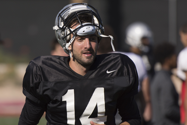 Kurt Palandech (14) takes a rest during football practice at UNLV's Rebel Park in Las Vegas, Tuesday, Sept. 27, 2016. (Jason Ogulnik/Las Vegas Review-Journal)