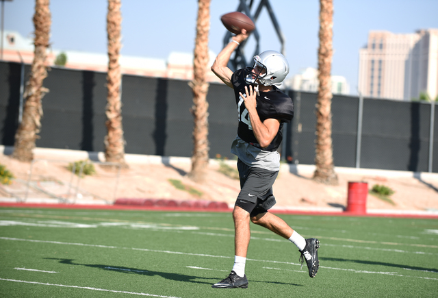 Quarterback Kurt Palandech throws the ball during football practice at Rebel Park inside the UNLV campus in Las Vegas on Thursday, Aug. 25, 2016. (Martin S. Fuentes/Las Vegas Review-Journal)