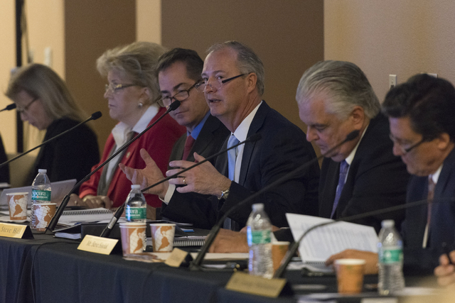 Southern Nevada Tourism Infrastructure committee chairman Steve Hill, center, speaks during a Southern Nevada Tourism Infrastructure committee meeting at UNLV in Las Vegas to discuss the proposed  ...