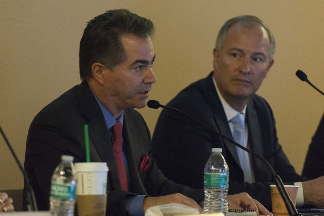 Southern Nevada Tourism Infrastructure vice chairman and president of UNLV, Len Jessup, left, speaks during a Southern Nevada Tourism Infrastructure committee meeting at UNLV in Las Vegas to discu ...
