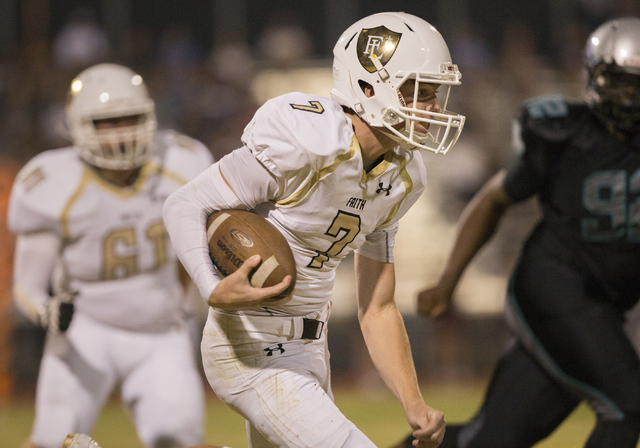 Faith Lutheran quarterback Sagan Gronauer (7) scrambles down the sideline during the Crusaders road matchup with the Skyhawks on Friday, Sept. 16, 2016, at Silverado High School, in Las Vegas. Ben ...