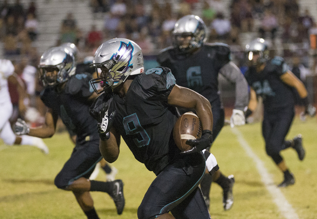 Silverado running back Nahzi Salih (9) streaks down the sideline during the Skyhawks home matchup with the Faith Lutheran Crusaders on Friday, Sept. 16, 2016, at Silverado High School, in Las Vega ...