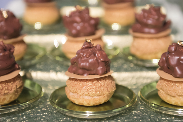 Pastry chef with Aria hotel-casino Kyurim Lee's dessert entry is seen during the Girl Scouts of Southern Nevada &quot;Dessert Before Dinner&quot; charity event at Caesars Palace hotel-casi ...