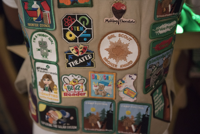 Merit badges are seen on a girl scout uniform during the Girl Scouts of Southern Nevada &quot;Dessert Before Dinner&quot; charity event at Caesars Palace hotel-casino in Las Vegas, Saturda ...